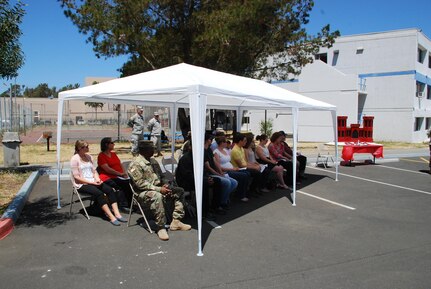 The family and friends of Sgt. Logan Sutherland, along with distinguished guests of the 301st Maneuver Enhancement Brigade, look on, as the ceremony awarding Sutherland the Soldier’s Medal, is about to begin. Sutherland, a horizontal construction engineer assigned to 801st EN CO (H), 315th EN BN, 301st MEB, on Jan. 1, 2015, risked his life by forcing himself into a burning vehicle, in order to evacuate an unconscious driver, and pulled the driver from the vehicle just before the vehicle became fully engulfed in flames, saving the driver’s life. (U.S. Army photo by Sgt. Timothy Neal/Released)