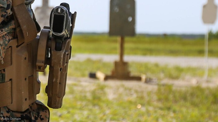 A Beretta M9 pistol sits holstered on the hip of a Marine with 2nd Law Enforcement Battalion during a weeklong weapon training exercise at Marine Corps Base Camp Lejeune, N.C., August 9, 2016. Marines advanced to the firing line where they stood facing their targets waiting to firing pistols in several drills designed to enhance their skills with the weapon. 