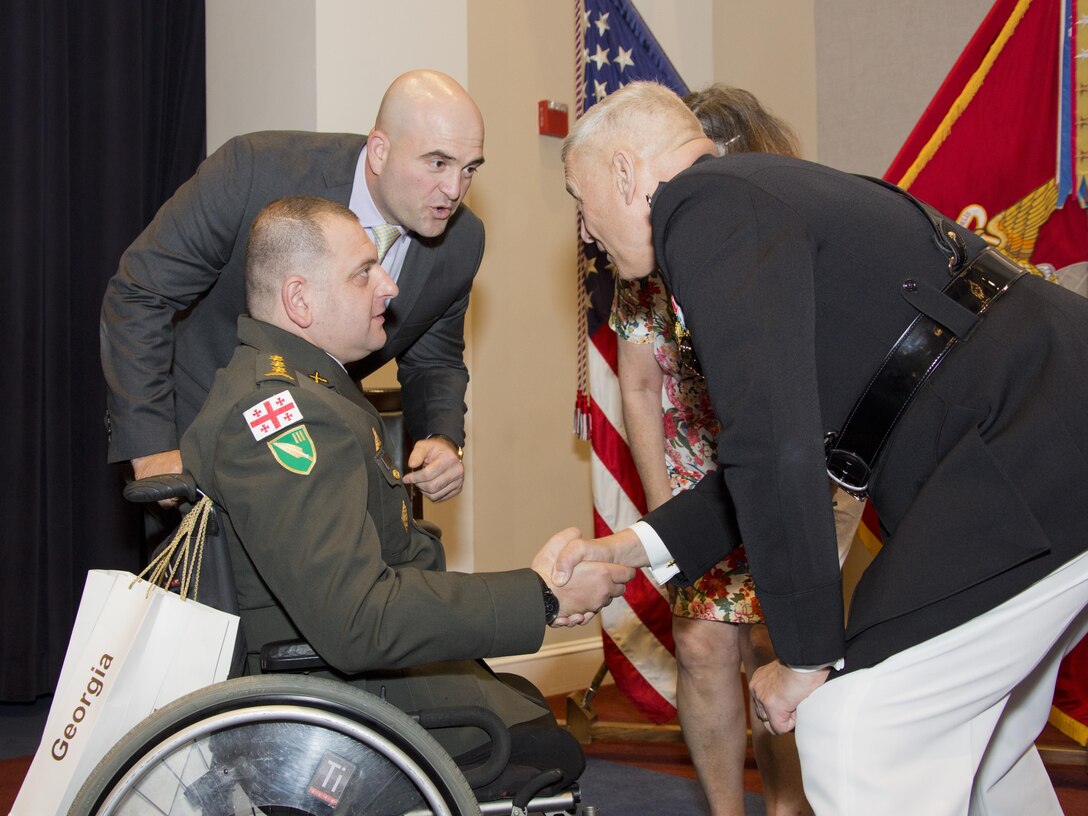 U.S. Marine Corps Gen. John M. Paxton Jr., 33rd assistant commandant of the Marine Corps, speaks with guests after his retirement ceremony at Marine Barracks Washington, Washington, D.C., Aug. 4, 2016. Paxton retired after serving 42 years in the Marine Corps. (U.S. Marine Corps photo by Lance Cpl. Hailey D. Stuart)
