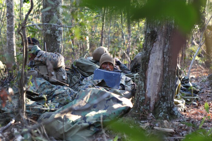 A radio reconnaissance team collects communications signals in the field during an Intelligence Interoperability Course at Marine Corps Base Camp Lejeune, N.C. The Magnetic Intrusion Detector II is a magnetic sensor that can be easily concealed and is used by Marine units to detect the presence of targets moving within its electromagnetic fields. Marine Corps Systems Command’s Marine Intelligence program office fielded the system six months ahead of schedule to give operational leaders better situational awareness in theater.   (U.S. Marine Corps photo)