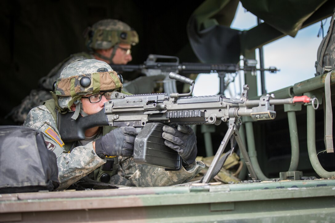 U.S. Army Spc. Paul Turner, 652nd Engineer Company, Ellsworth, Wis., engages enemy troops during Combat Support Training Exercise (CSTX) 86-16-03 at Fort McCoy, Wis., August 9, 2016. The 84th Training Command’s third and final Combat Support Training Exercise of the year hosted by the 86th Training Division at Fort McCoy, Wis. is a multi-component and joint endeavor aligned with other reserve component exercises. (U.S. Army photo by Spc. John Russell/Released)8