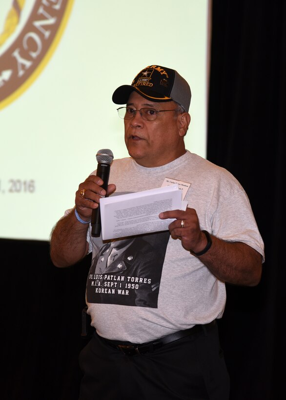 Carlos Torres Mendoza, nephew of Army Cpl. Luis Patlan Torres, shares his story during  a remembrance ceremony, Aug. 11, 2016, at the Korean/Cold War Annual government briefings in Arlington, Virginia. There were 426 family members of servicemen who attending the briefings. 