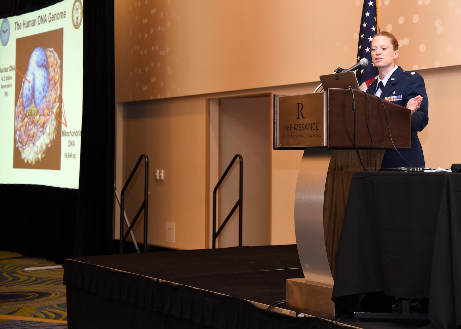 Air Force Lt. Col. Alice Briones, Armed Forces Medical Examiner System Department of Defense DNA Registry director, gives a brief Aug. 12, 2016, at the the Korean/Cold War Annual government briefings in Arlington, Virginia. Briones briefed about the DNA process as well as how family references are important for identification. (U.S. Air Force photo/Senior Airman Ashlin Federick)