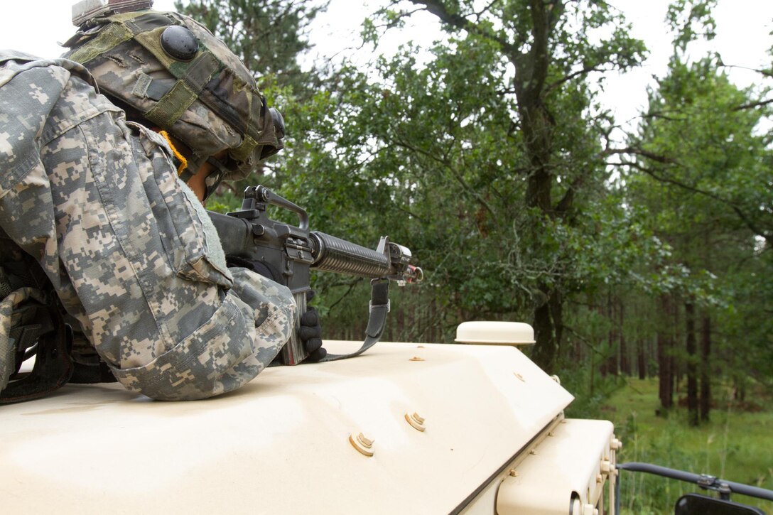 U.S. Army Spc. Nguyen Pham, 652nd Engineer Company, Hammond, WI, pulls perimeter security during Land Bridging Operations during Combat Support Training Exercise (CSTX) 86-16-03 at Fort McCoy, Wis., August 11, 2016. The 84th Training Command’s third and final Combat Support Training Exercise of the year hosted by the 86th Training Division at Fort McCoy, Wis. is a multi-component and joint endeavor aligned with other reserve component exercises. (U.S. Army photo by Spc. Garrett Johnson/Released)