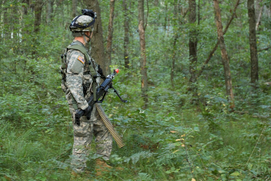 U.S. Army Staff Sgt. Chad Windsperger, 644th Regional Support Group, Maple Grove, MN, searches  for potential opposing forces on a perimeter patrol during Combat Support Training Exercise (CSTX) 86-16-03 at Fort McCoy, Wis., August 9, 2016. The 84th Training Command’s third and final Combat Support Training Exercise of the year hosted by the 86th Training Division at Fort McCoy, Wis. is a multi-component and joint endeavor aligned with other reserve component exercises. (U.S. Army photo by Spc. Garrett Johnson/Released)