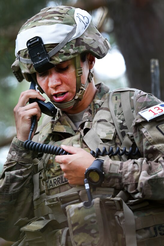 Army Staff Sgt. Vanessa Carrillo prepares to call for fire during the 2016 European Best Warrior Competition at the 7th Army Training Command's Grafenwoehr Training Area, Germany, Aug. 8, 2016. Carrillo is assigned to the 21st Theater Sustainment Command. Army photo by Gertrud Zach    
