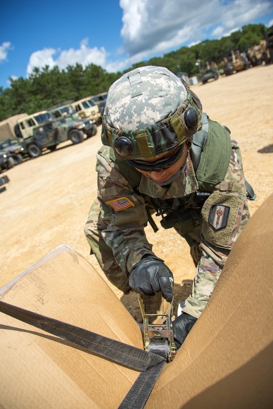 U.S. Army Reserve Spc. Rabi Shrastha, A Company, 533rd Brigade Support Battalion, Fort Totten, New York, secures a pallet to be transported via M1075 Palletized Load System during a Combat Support Training Exercise at Fort McCoy, Wis., August 13, 2016. The 84th Training Command’s third and final Combat Support Training Exercise of the year hosted by the 86th Training Division at Fort McCoy, Wis. is a multi-component and joint endeavor aligned with other reserve component exercises. (U.S. Army photo by Sgt. Robert Farrell/Released)
