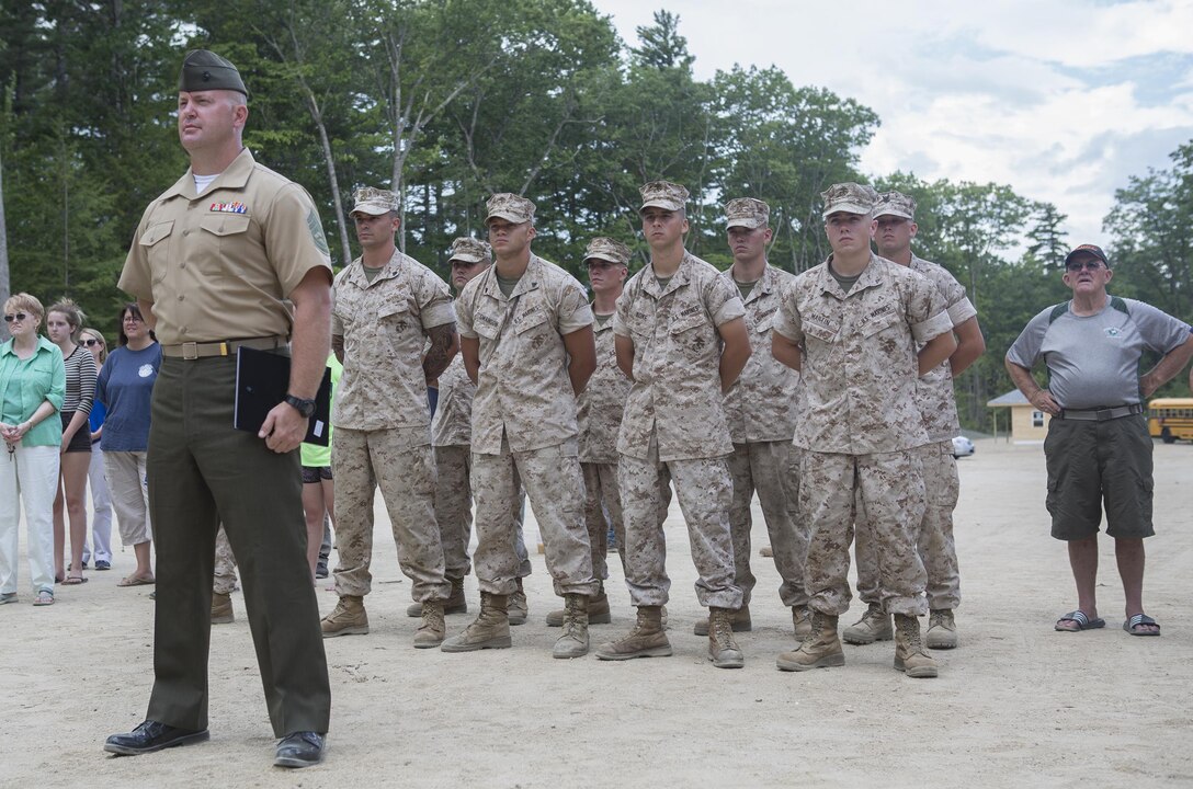 Marines with 6th Engineer Support Battalion, 4th Marine Logistics Group, Marine Forces Reserve, stand in formation as they attend the John H. Rich Jr. and Doris Lee Rich Memorial Beach and Ice Fishing Access Facility Dedication Ceremony in Standish, Maine, August 12, 2016. The Marines helped make the beach more accessible to the community during their annual Innovative Readiness Training exercise. (U.S. Marine Corps photo by Sgt. Sara Graham) 