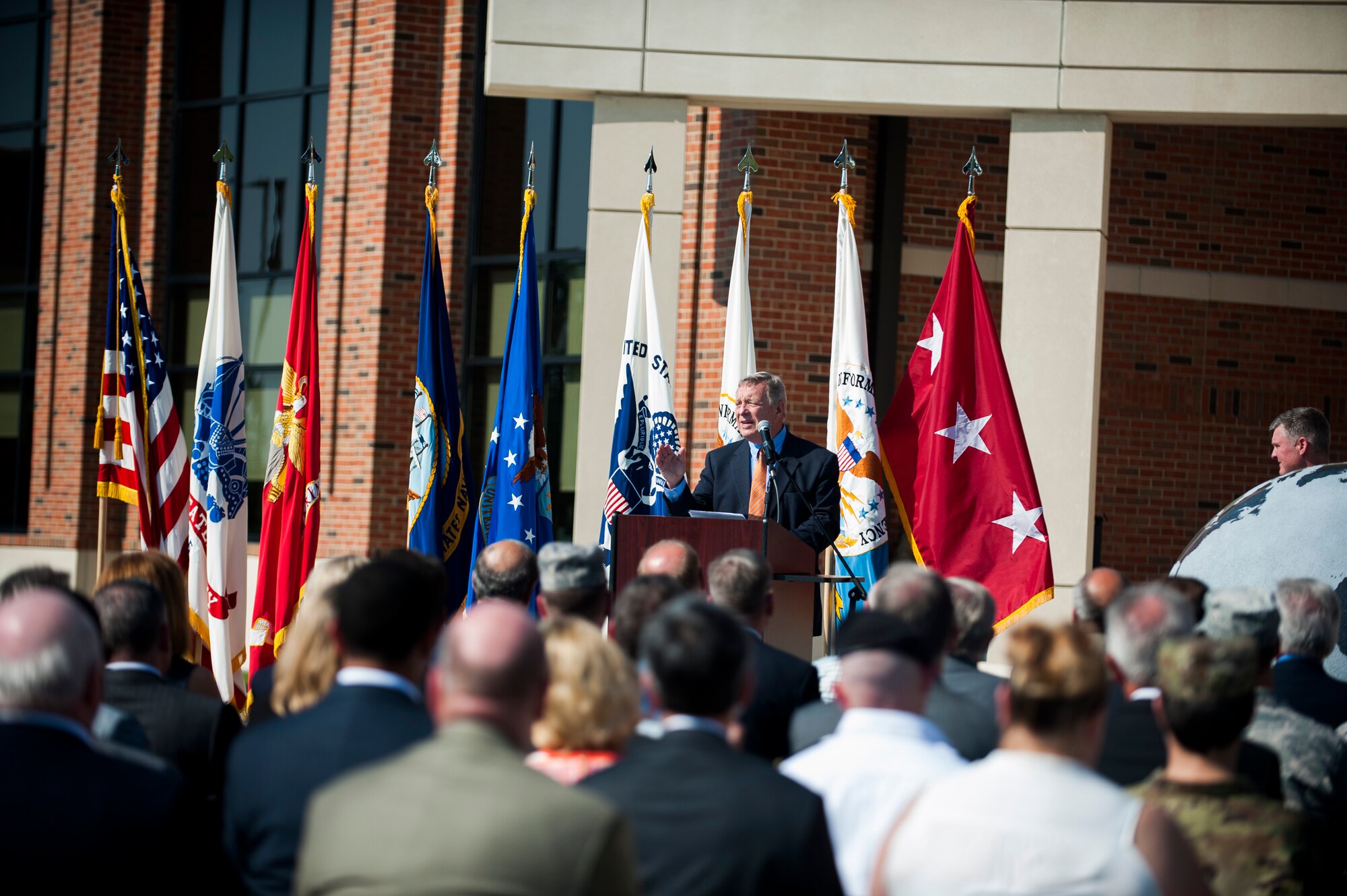 Sen. Dick Durbin delivers a speech during a ribbon cutting ceremony for the new Defense Information Systems Agency compound at Scott Air Force Base, Ill., Aug. 11, 2016. Civil leaders from across the state attended the opening of the state of the art compound. (U.S. Air Force photo by Staff Sgt. Clayton Lenhardt/Released)