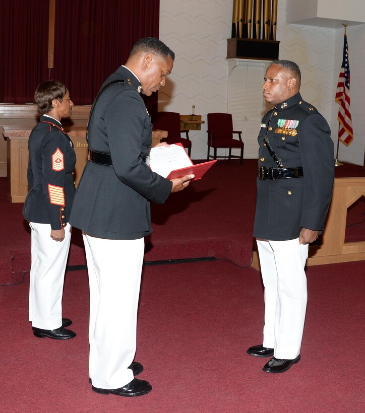 Maj. Gen. Craig Crenshaw (left), commanding general, Marine Corps Logistics Command, serves as the retiring official for Maj. Lee Taylor (right), operations actions officer/mission assurance officer, LOGCOM, in a ceremony at Marine Corps Logistics Base Albany's Chapel of the Good Shepherd, Aug. 12. Taylor, who has devoted 30 years in service to the nation, began his active-duty career in the enlisted ranks, later attended Officer Candidate School and became a Marine commissioned officer in March 2002.