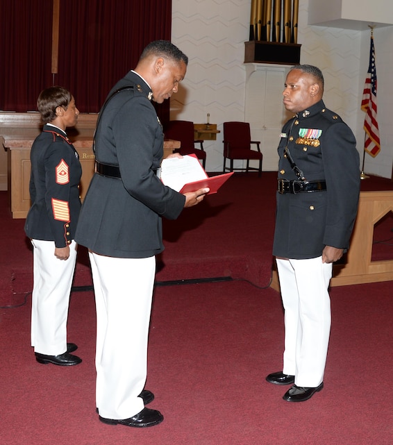 Maj. Gen. Craig Crenshaw (left), commanding general, Marine Corps Logistics Command, serves as the retiring official for Maj. Lee Taylor (right), operations actions officer/mission assurance officer, LOGCOM, in a ceremony at Marine Corps Logistics Base Albany's Chapel of the Good Shepherd, Aug. 12. Taylor, who has devoted 30 years in service to the nation, began his active-duty career in the enlisted ranks, later attended Officer Candidate School and became a Marine commissioned officer in March 2002.