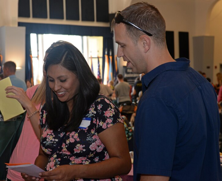 Members of Team Beale receive information about programs offered in the local community during Beale’s Baby Shower Aug. 13, 2016, at Beale Air Force Base, California. The event provided Team Beale’s new and expecting families the opportunity to build relationships with others, participate in baby shower activities and get information from approximately 40 agencies on and off base. The agencies provide services and information such as nutrition assistance, healthy living information, child development and parental education. (U.S. Air Force photo by Airman Tristan D. Viglianco)