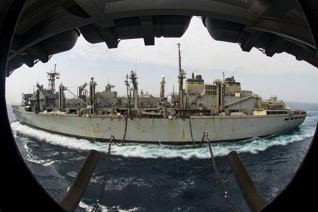 The fast-combat support ship USNS Arctic conducts a replenishment with the USS Dwight D. Eisenhower in the Persian Gulf, Aug. 12, 2016. The aircraft carrier is supporting Operation Inherent Resolve, maritime security operations and theater security cooperation efforts in the U.S. 5th Fleet area of operations. Navy photo by Seaman Dartez C. Williams