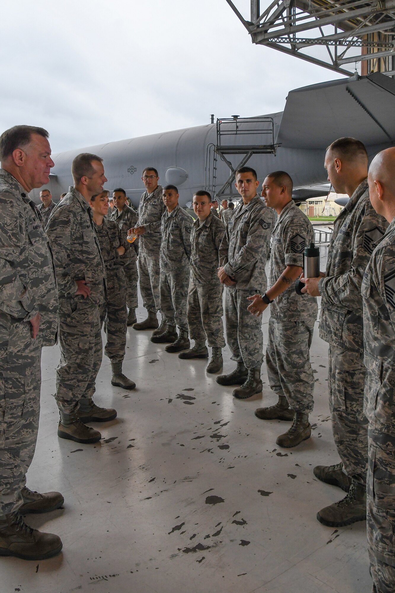 U.S. Air Force Col. Ty Neuman, the 2nd Bomb Wing commander, and Chief Master Sgt. Teresa Clapper, the Command Chief for the 2 BW, speak with Active Duty and Reserve Airmen assigned to the 307th Aircraft Maintenance Squadron on August 15, 2016. Neuman is the new base commander for Barksdale Air Force Base in Louisiana and is receiving a tour of the 307th Bomb Wing which is a tenant unit on the base. (U.S. Air Force photo by Master Sgt. Dachelle Melville/Released)
