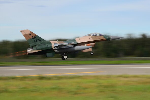 A U.S. Air Force F-16 Fighting Flacon aircraft assigned to the 18th Aggressor Squadron (AGRS) takes off from the Eielson Air Force Base, Alaska, flightline during RED FLAG-Alaska (RF-A) 16-3, Aug. 15, 2016. The 18th AGRS supports RF-A by sharing its knowledge of flying with participating units in the exercise, which ensures the U.S. and its allies receive the best air combat training possible. (U.S. Air Force photo by Airman 1st Class Cassandra Whitman)