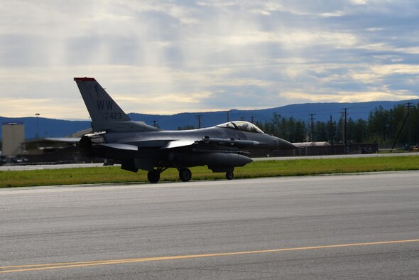 A U.S. Air Force F-16 Fighting Falcon aircraft assigned to the 13th Fighter Squadron assigned to Misawa Air Base, Japan, taxis on the Eielson Air Force Base, flightline during RED FLAG-Alaska (RF-A) 16-3, Aug. 15, 2016. RF-A exercises are vital to maintaining peace and stability in the Indo-Asia-Pacific region. (U.S. Air Force photo by Airman 1st Class Cassandra Whitman)