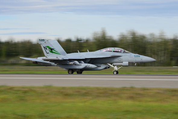 A U.S. Navy EA-18G Growler aircraft assigned to Electronic Attack Squadron 135, Naval Air Station Whidbey Island, Wash., takes off for a morning sortie during RED FLAG-Alaska (RF-A) 16-3 at Eielson Air Force Base, Alaska, Aug. 15, 2016. RF-A provides realistic combat training essential to the success of air and space operations. (U.S. Air Force photo by Airman 1st Class Cassandra Whitman)