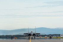 A U.S. Air Force F-15E Strike Eagle dual-role fighter aircraft assigned to the 336th Fighter Squadron from Seymour Johnson Air Force Base, N.C., taxis to the equipment test cell prior to a sortie at Eielson Air Force Base, Alaska, Aug. 15, 2016, during RED FLAG-Alaska (RF-A) 16-3. Free exchange of ideas between multilateral forces during RF-A enhances not just partners and sister-service relationships, but also their operational efficiency. (U.S. Air Force photo by Staff Sgt. Shawn Nickel)