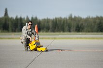 U.S. Air Force Senior Airman Michael Kelley, an avionics technician assigned to the 35th Aircraft Maintenance Unit from Kunsan Air Base, Republic of Korea, operates equipment in the test cell to ensure weapons and electronic warfare equipment on fighter jets work properly for a sortie at Eielson Air Force Base, Alaska, Aug. 15, 2016, during RED FLAG-Alaska (RF-A) 16-3. By working along side other Airmen, even though they are from different bases in the Indo-Asia-Pacific region, avionics technicians sharpen their combat skills by working in the exercise, which is aimed at creating a realistic threat environment at simulated forward operating bases. (U.S. Air Force photo by Staff Sgt. Shawn Nickel)