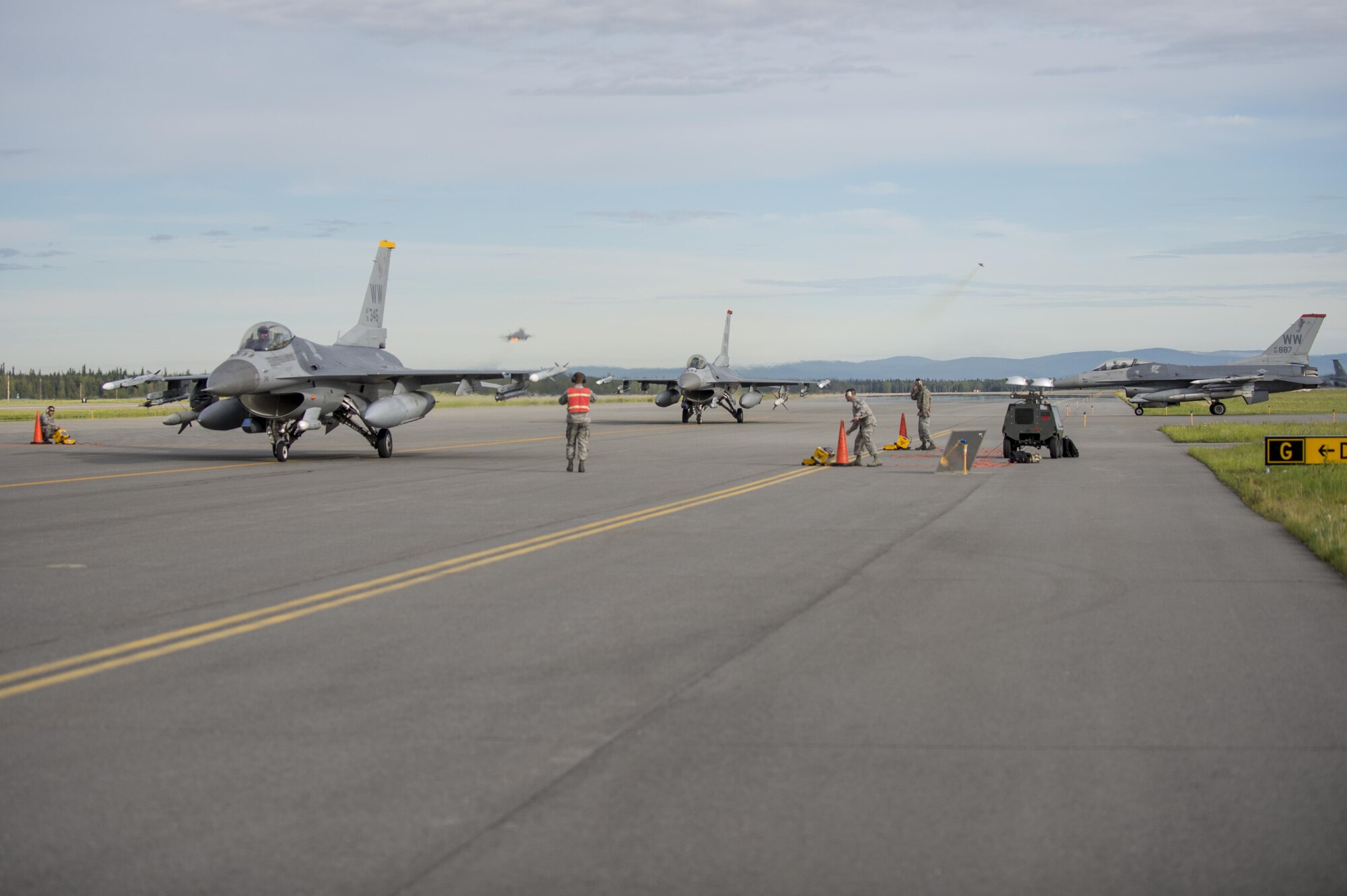 U.S. Air Force F-16 Fighting Falcon aircraft assigned to the 35th Fighter Squadron from Kunsan Air Base, Republic of Korea, taxi into the test cell to ensure weapons and electronic warfare equipment work properly for a sortie at Eielson Air Force Base, Alaska, Aug. 15, 2016, during RED FLAG-Alaska (RF-A) 16-3. RF-A is conducted in the Joint Pacific Alaska Range Complex, which provides more than 67,000 square miles of airspace, including one conventional bombing range and two tactical bombing ranges containing 510 different types of targets and 45 threat simulators, both manned and unmanned. (U.S. Air Force photo by Staff Sgt. Shawn Nickel)