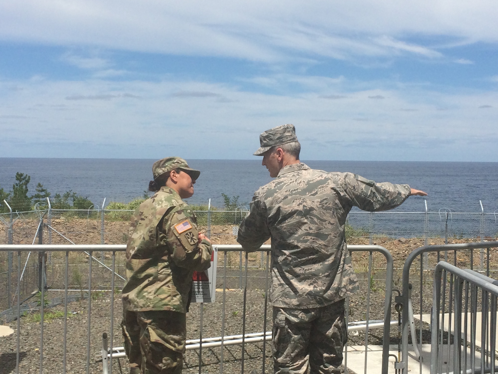 U.S. Army Maj. Sara Cardenas, 14th Missile Defense Battery commander, briefs U.S. Air Force Gen. Terrence J. O’Shaughnessy, Pacific Air Forces commander, during his visit to the AN/TPY-2 radar site at Kyogamisaki, Japan, Aug. 9, 2016. The general visited the ballistic missile defense site and spoke with 14th Missile Defense Battery Soldiers who are responsible for the operations and maintenance of the system as part of his first trip to the Indo-Asia-Pacific region as the commander of PACAF. (U.S. Air Force photo by Maj. Jennifer Miller)