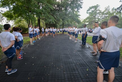 The 628th Comptroller Squadron waits to find out what their next physical training session is going to be on Joint Base Charleston, S.C., Aug. 5, 2016. Being recognized by the Health and Wellness Center as one of the healthiest and most fit squadrons with an obesity rate five percent lower than the rest of the other squadrons on base. (U.S. Air Force photo by Airman 1st Class Thomas T. Charlton)