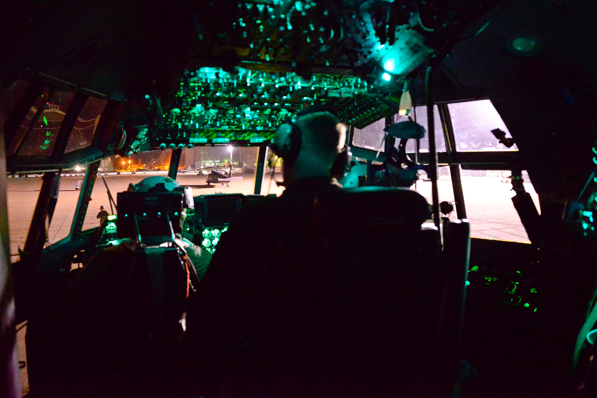California Air National Guardsmen from the 129th Rescue Wing, Moffett Federal Airfield, Calif., prepares an MC130P Combat Shadow aircraft for a night-time overwater operation, August 12, 2016.  The Guardsmen are preparing for an overwater rescue mission on the Pacific Ocean in response to a seriously ill 37-year-old crewman on board the HMCS Calgary, a Canadian naval frigate, 800 miles off shore from San Francisco. (U.S. Air National Guard photo by Master Sgt. Ray Aquino/released)