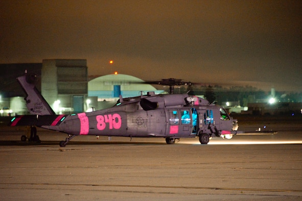 An HH60G Pave Hawk helicopter assigned with the 129th Rescue Wing, Moffett Federal Airfield, prepares for take-off, August 12, 2016.   California Air National Guardsmen from the 129th Rescue Wing conducts an overwater rescue mission on the Pacific Ocean in response to a seriously ill 37-year-old crewman on board the HMCS Calgary, a Canadian naval frigate, 800 miles off shore from San Francisco. (U.S. Air National Guard photo by Master Sgt. Ray Aquino/released)