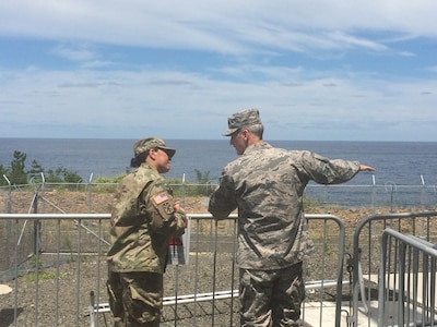 U.S. Army Maj. Sara Cardenas, 14th Missile Defense Battery commander, briefs U.S. Air Force Gen. Terrence J. O’Shaughnessy, Pacific Air Forces commander, during his visit to the AN/TPY-2 radar site at Kyogamisaki, Japan, Aug. 9, 2016. The general visited the ballistic missile defense site and spoke with 14th Missile Defense Battery Soldiers who are responsible for the operations and maintenance of the system as part of his first trip to the Indo-Asia-Pacific region as the commander of PACAF. (U.S. Air Force photo by Maj. Jennifer Miller)