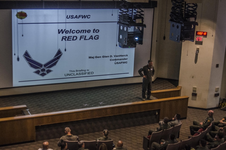 Maj. Gen. Glen VanHerck, United States Air Force Warfare Center commander, speaks to players of Red Flag 16‐4 at Nellis Air Force Base, Nev., Aug. 14, 2016. The first Red Flag exercise took place 40 years ago and has since evolved into one of the world’s most premier combat training exercises a pilot can attend. (U. S. Air Force photo by Tech. Sgt. Frank Miller/Released)