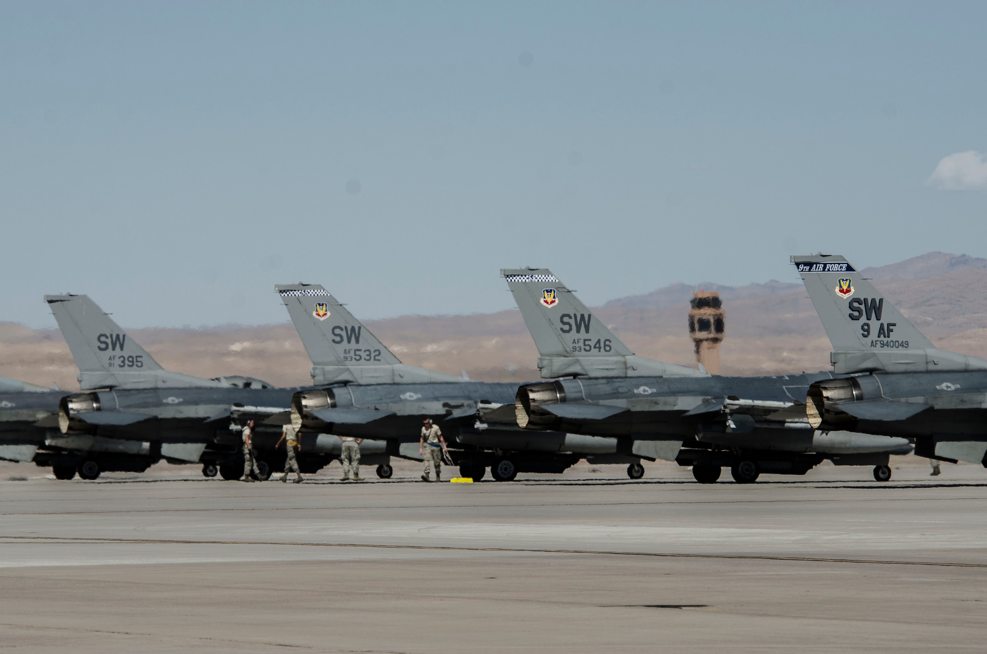 U.S. Air Force maintainers from the 20th Fighter Wing, Shaw Air Force Base, S.C., ready F‐16CM Fighting Flacons, 55th Fighter Squadron, Shaw Air Force Base, S.C., for takeoff at Nellis Air Force Base, Nev., Aug. 13, 2016. In Red Flag 16‐4 the 55th FS F‐16’s will join forces with other air frames such as F‐15 Strike Eagles, and EF‐18 Super Hornets to fight up to 250 aggressors. (U. S. Air Force photo by Tech. Sgt. Frank Miller/Released)