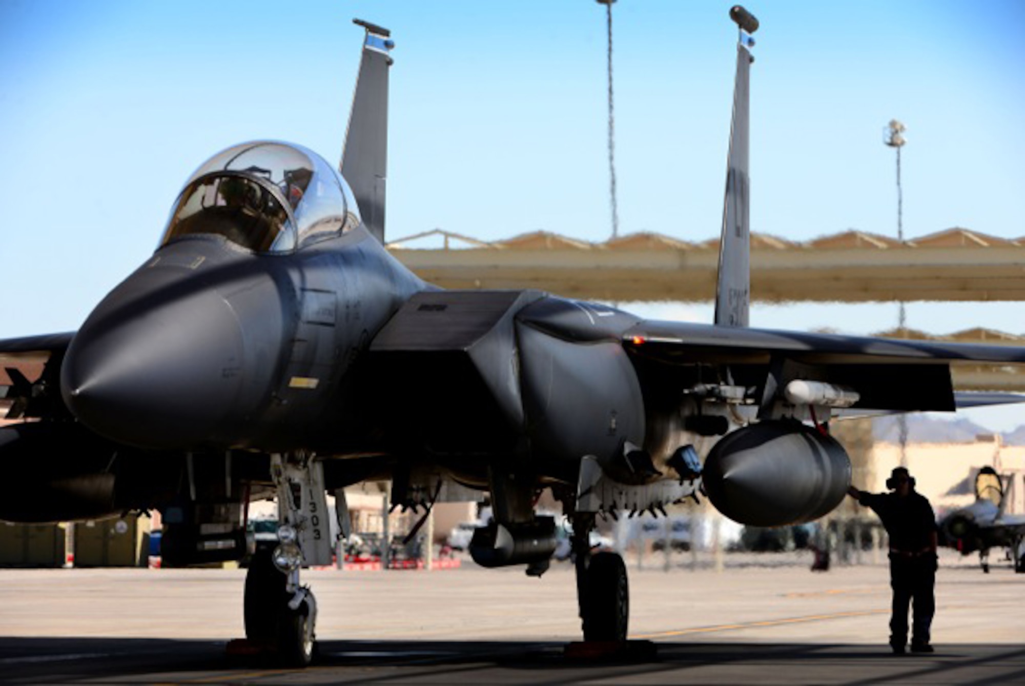 An F-15E Strike Eagle from the 492nd Fighter Squadron awaits clearance to taxi for a sortie in preparation for exercise Red Flag 16-4 at Nellis Air Force Base, Nevada, Aug 12. Red Flag is the U.S. Air Force’s premier air-to-air combat training exercise and one of a series of advanced training programs that is administered by the U.S. Air Force Warfare Center and executed through the 414th Combat Training Squadron. (U.S. Air Force photo/ Tech. Sgt. Matthew Plew)