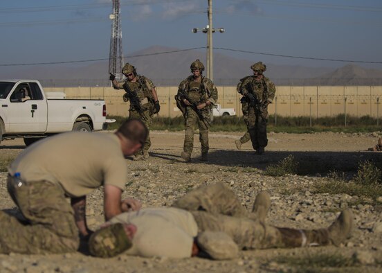 Pararescue specialists from the 83rd Expeditionary Rescue Squadron, rush to assist simulated wounded patients during a mass casualty exercise, Bagram Airfield, Afghanistan, Aug. 16, 2016. The 83rd ERQS participates in a real world scenario exercises in order to maintain readiness standards and demonstrate theater personnel recovery capabilities. (U.S. Air Force photo by Senior Airman Justyn M. Freeman)