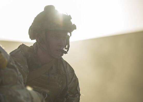 Senior Airman Ty Hatcher, 83rd Expeditionary Rescue Squadron pararescue specialist communicates through a headset during a mass casualty exercise, Bagram Airfield, Afghanistan, Aug. 16, 2016. Pararescue specialists maintain constant communication during rescue operations to ensure expedited care and rescue. (U.S. Air Force photo by Senior Airman Justyn M. Freeman)