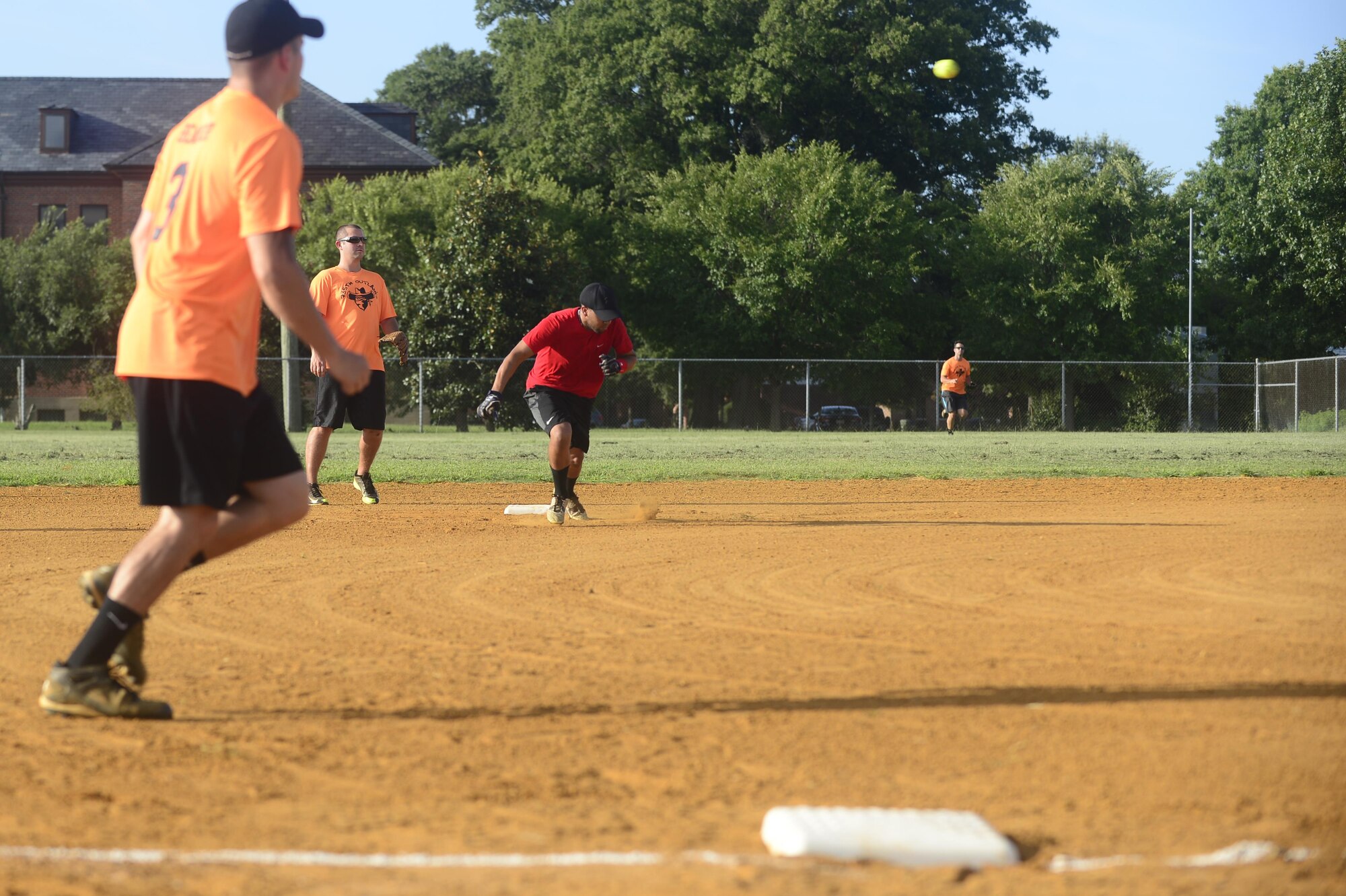 U.S. Air Force Airman 1st Class Aaron, 10th Intelligence Squadron signals analyst, runs to third base during the 2016 Intramural Softball Championship game at Langley Air Force Base, Va., Aug. 10, 2016. The 30th Intelligence Squadron came back in the seventh inning with a home-run providing a close 5-4 victory. (U.S. Air Force photo by Airman 1st Class Kaylee Dubois)