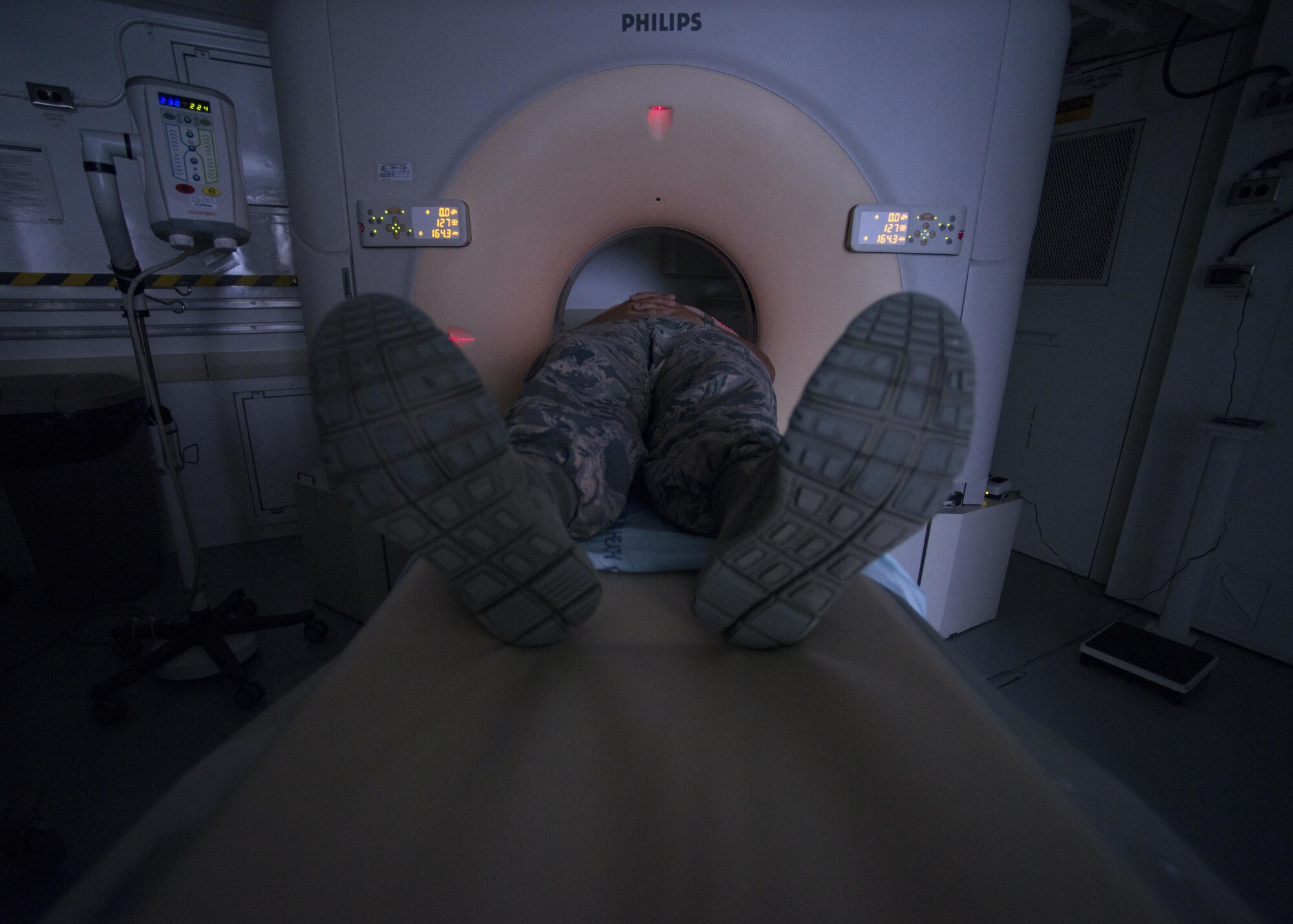 A patient has a computerized tomography scan, commonly known as a CT scan, Aug. 15, 2016, at Aviano Air Base, Italy. The 31st Surgical Operations Squadron uses a CT scanner to help physicians determine the extent of an injury or illness. (U.S. Air Force photo by Airmen 1st Class Cory W. Bush/Released)