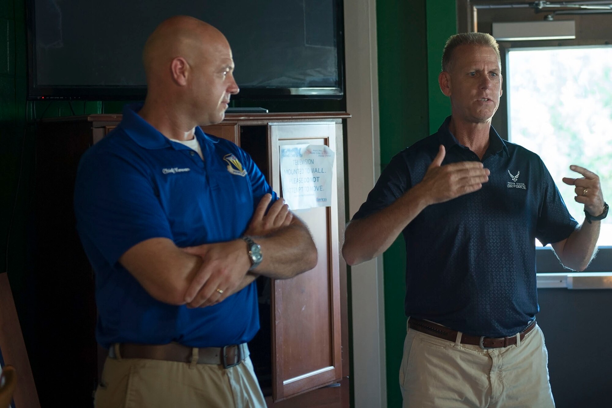 Col. Larry Shaw, 434th Air Refueling Wing commander, speaks to a crowd with Chief Master Sgt. Robert Herman, 434th ARW commander, during Herman’s going away ceremony here Aug. 6th, 2016. Herman will be moving to the nation’s Capital as the chief of senior enlisted management at the Pentagon. (U.S. Air Force photo/Staff Sgt. Jami K. Lancette)