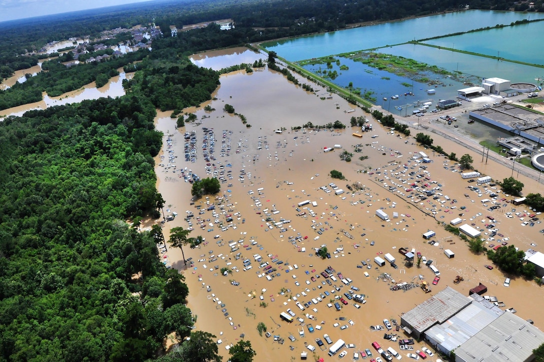 A view from an MH-65 Dolphin helicopter shows flooding and devastation in Baton Rouge, La., Aug. 15, 2016, where service members have rescued residents and provided relief. Coast Guard photo by Petty Officer 1st Class Melissa Leake