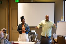 Maj. LaToya Smith and Chief Master Sgt. Peter Smith speak during a resiliency session as part of a family retreat at Keystone, Colorado, Saturday, Aug. 13, 2016. The 50th Space Wing Chapel Office sponsored the event and asked the Smiths to speak to attendees and share their experiences as a military family. (Courtesy photo)