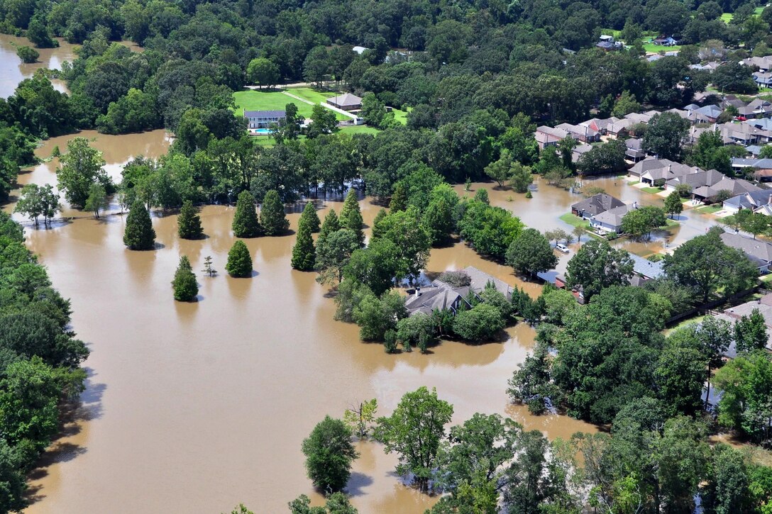 An aerial view taken from an MH-65 Dolphin helicopter shows severe flooding in a residential area of Baton Rouge, La., Aug. 15, 2016. Coast Guard photo by Petty Officer 1st Class Melissa Leake