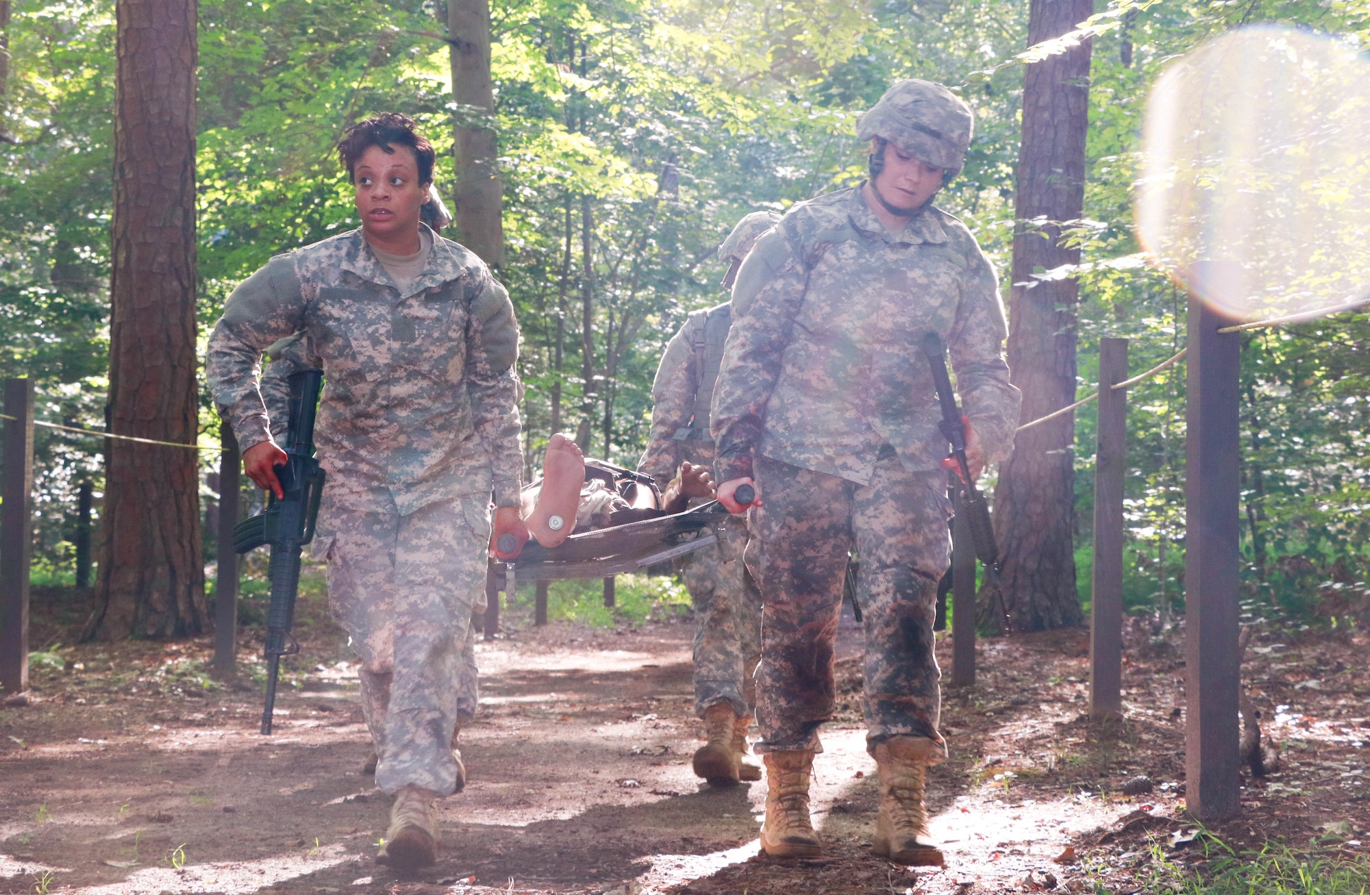 U.S. Army Soldiers perform a litter carry during a combat lifesaver course hosted by 7th Transportation Brigade (Expeditionary) at Fort Eustis, Va., Aug. 11, 2016. CLS certification includes two parts: a week in classroom and a hands-on exercise that tests the ability of the Soldier to apply classroom applications to treat a casualty. (U.S. Army photo by Spc. RomanRivera Wilmarys)