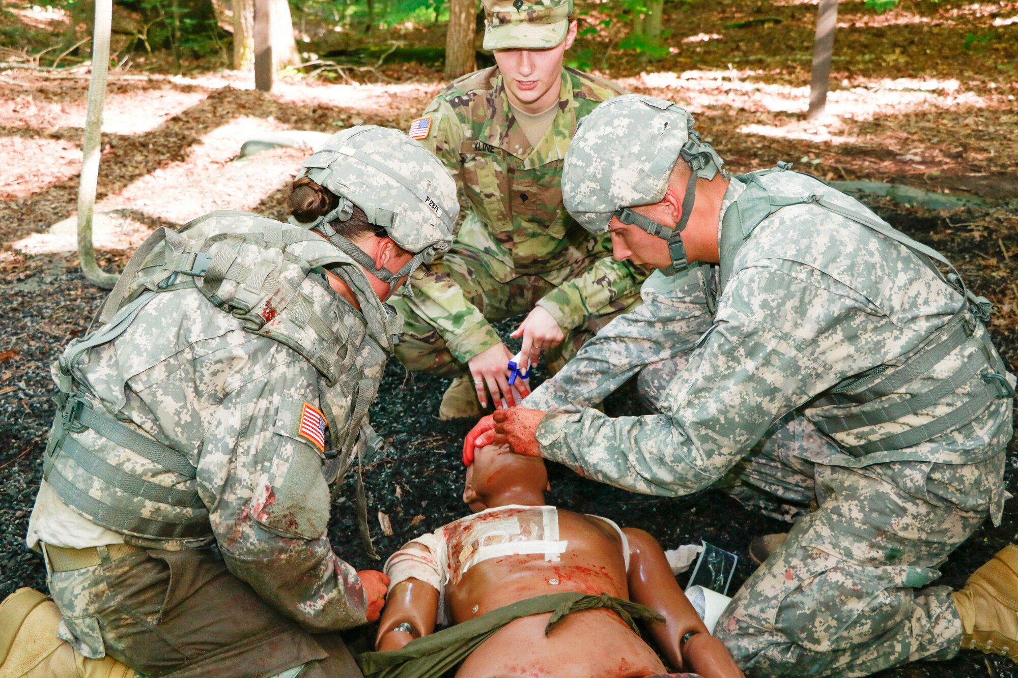 U.S. Army Spc. Chelsea Kline, 7th Transportation Brigade (Expeditionary), gives combat lifesaving instructions during a combat lifesaver course hosted by 7th Transportation Brigade (Expeditionary) at Fort Eustis, Va., Aug. 11, 2016. The Combat Lifesaver may assist the combat medic in providing care and preparing casualties for evacuation when the Combat Lifesaver has no other combat duties to perform. (U.S. Army photo by Spc. RomanRivera Wilmarys)