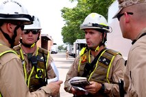 Leadership personnel for Initial Response Force, IRF, A with the Chemical Biological Incident Response Force, CBIRF, meet after a deployment drill in preparation for the Democratic National Convention, DNC, in Philadelphia, July 25, 2016. CBIRF’s Marines and sailors worked alongside federal and local agencies to provide chemical, biological, radiological, nuclear and high-yield explosives, CBRNE, response capability for the Republican and Democratic National Conventions.
CBIRF is an active duty Marine Corps unit that, when directed, forward-deploys and/or responds with minimal warning t o a chemical, biological, radiological, nuclear or high-yield explosive (CBRNE) threat or event in order to assist local, state, or federal agencies and the geographic combatant commanders in the conduct of CBRNE response or consequence management operations, providing capabilities for command and control; agent detection and identification; search, rescue, and decontamination; and emergency medical care for contaminated personnel. (Official USMC Photo by Lance Cpl. Maverick S. Mejia/RELEASED)
