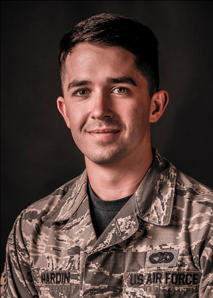 U.S. Air Force Senior Airman Shane Hardin, 563rd Operations Support Squadron aerial delivery journeyman, poses for a portrait at Davis-Monthan Air Force Base, Ariz., July 29, 2016. Hardin and Staff Sgt. Eric Fullmer 563rd OSS loadmaster, assisted motorists injured in a pile up on Interstate 8, during a sandstorm. (U.S. Air Force photo illustration by Airman Nathan H. Barbour)