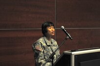 Sgt. Arleen Banioza, finance noncommissioned officer, 63rd Regional Support Command, pays tribute to Capt. Joel Ico during a memorial service for Ico, Aug. 14, headquarters auditorium, Mountain View, Calif. Ico died July 4 at the age of 41, following an accident at his residence. He is survived by his wife Michelle and 7 children. (U.S. Army Reserve photo by Capt. Alun Thomas)