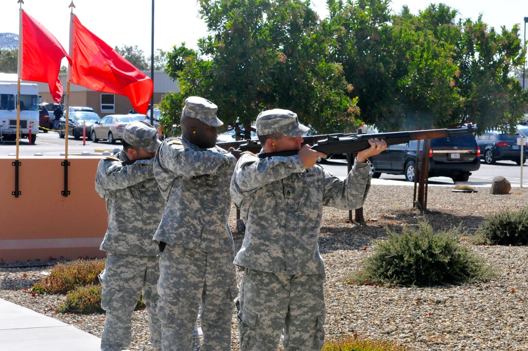 The 63rd Regional Support Command Honor Guard fires a 3-round volley during a memorial service for Capt. Joel Ico, Aug. 14, headquarters auditorium, Mountain View, Calif. Ico died July 4 at the age of 41, following an accident at his residence. He is survived by his wife Michelle and 7 children.(U.S. Army Reserve photo by Capt. Alun Thomas)