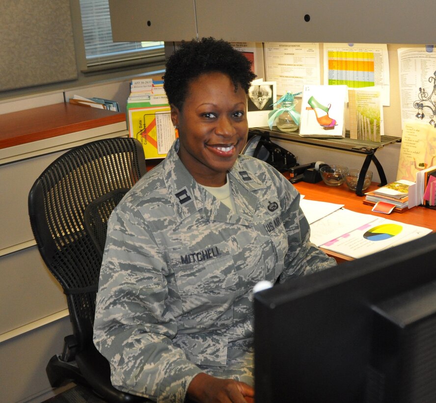 Capt. Avril Mitchell, assigned to the Air Reserve Personnel Center Pre-Trained Individual Manpower Management Division, was awarded the Personnel Reserve Component Company Grade Officer of the Year award. The Air Force-level award was for her work supporting wartime efforts through securing sustainable mobilization assets, codification of the ARPC Mobility Plan and execution of the Air Force’s only face-to-face screening activity. (U.S. Air Force photo by Tech. Sgt. Beth Anschutz)
