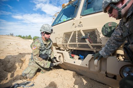 U.S. Staff Sgt. Army Christopher Rice, Bravo Company, 533 Maintenance Company, Devens, Mass., conducts vehicle recovery operations on a Light Medium Tactical Vehicle (LTV) during Combat Support Training Exercise (CSTX) 86-16-03 at Fort McCoy, Wis., August 9, 2016. The 84th Training Command’s third and final Combat Support Training Exercise of the year hosted by the 86th Training Division at Fort McCoy, Wis. is a multi-component and joint endeavor aligned with other reserve component exercises. (U.S. Army photo by Spc. John Russell/Released)