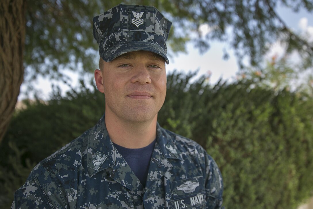 Petty Officer 1st Class David A. Whittington, corpsman, Public Health, Robert E. Bush Naval Hospital, has served in the Navy for 15 years. Throughout his career, he has enjoyed being able to serve alongside Marines. (Official Marine Corps photo by Lance Cpl. Levi Schultz/Released)