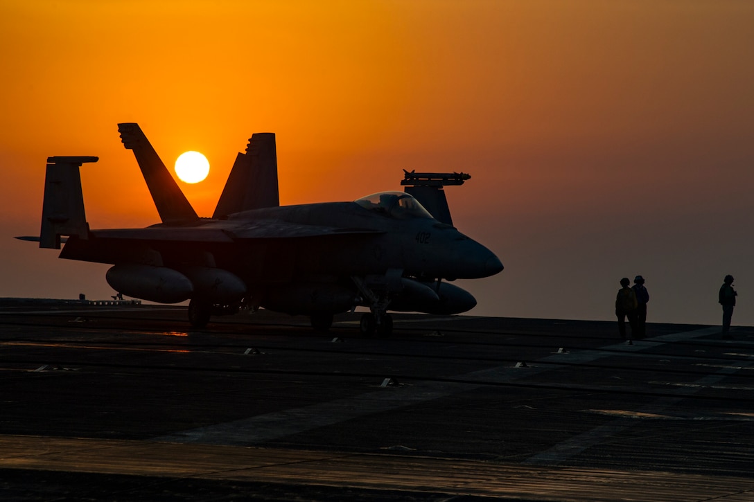 A Navy F/A-18E Super Hornet assigned to Strike Fighter Squadron 105 taxies across the flight deck of the aircraft carrier USS Dwight D. Eisenhower in the Persian Gulf, July 31, 2016. Navy photo by Petty Officer 3rd Class Nathan Beard